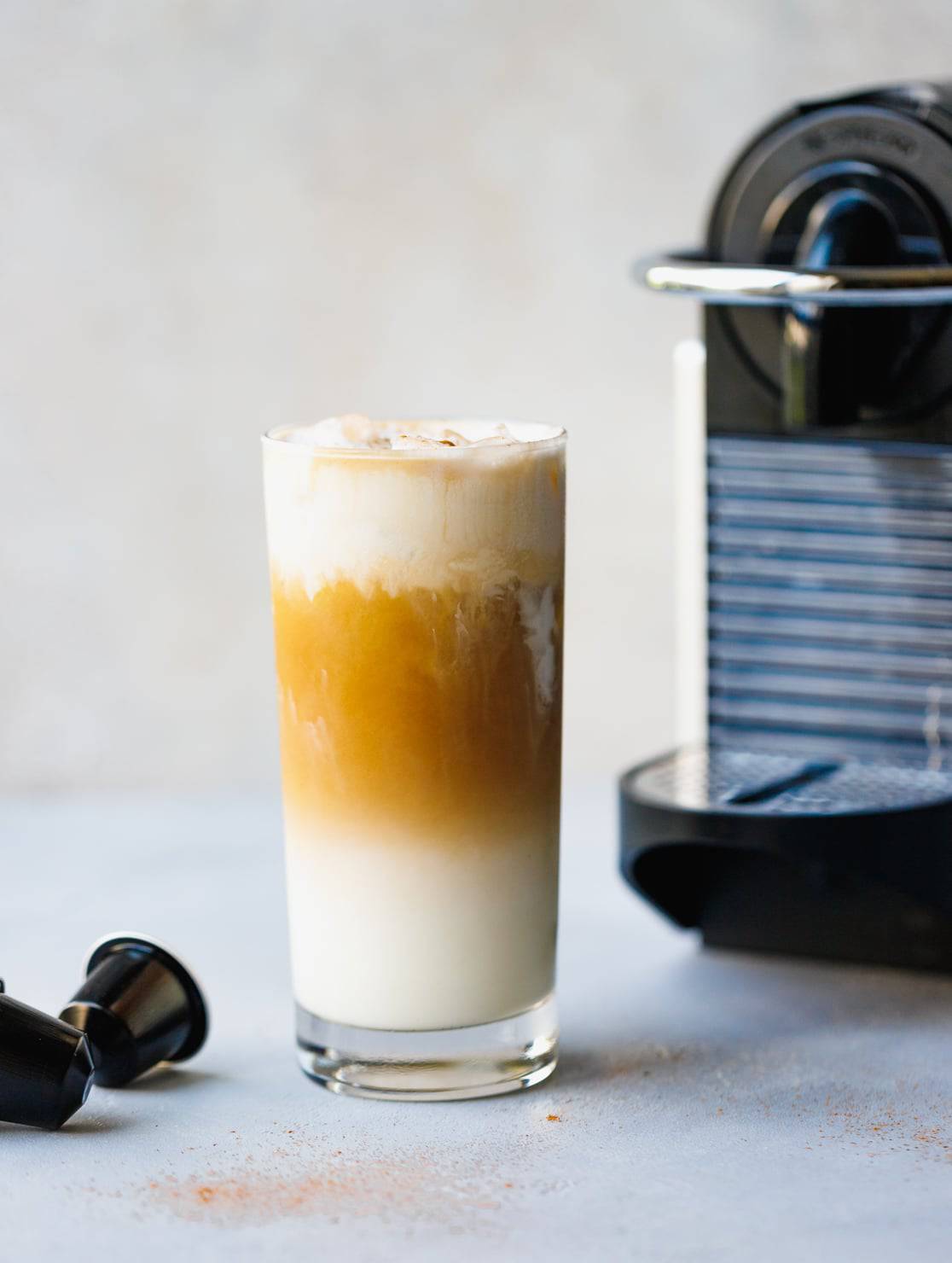 https://www.halfscratched.com/wp-content/uploads/2022/05/iced-vanilla-latte-nespresso.jpeg