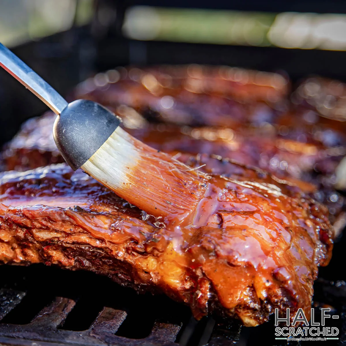 Adding sauce to ribs