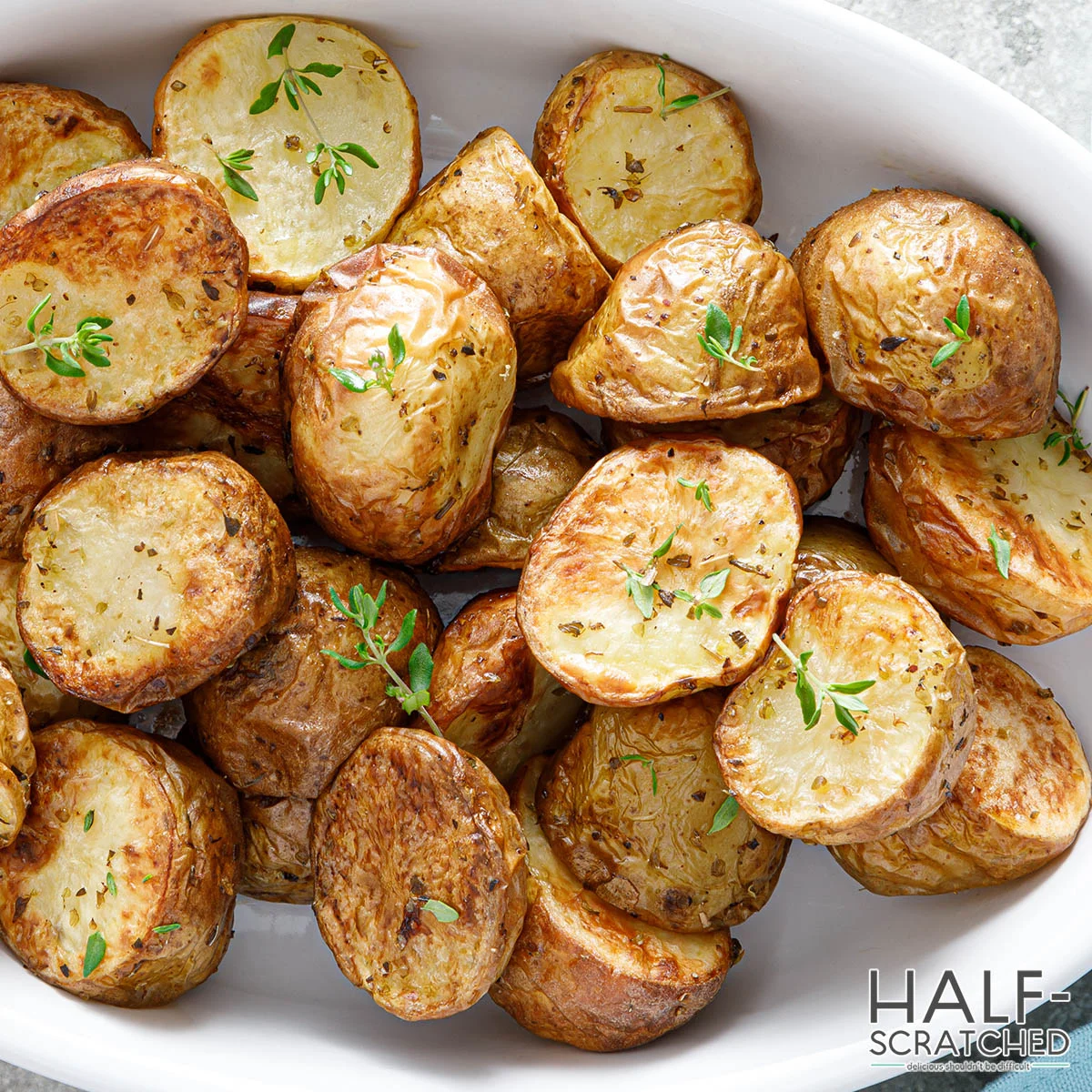 https://www.halfscratched.com/wp-content/uploads/2023/04/halved-baked-potatoes.jpg.webp