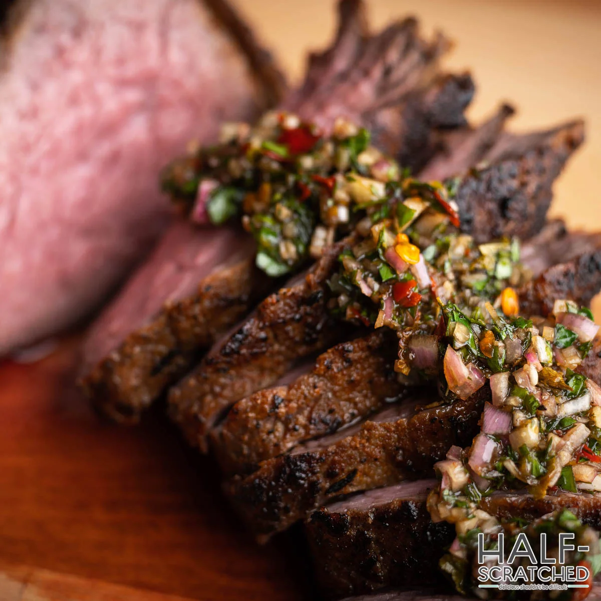 Tri tip close-up with herbs