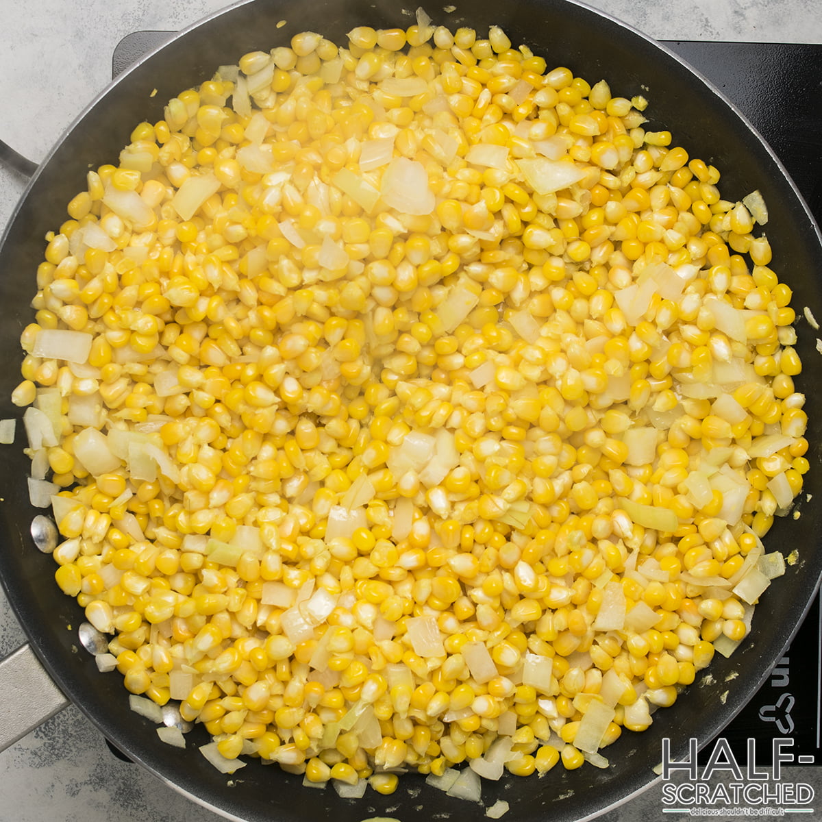 Cooking corn and onion