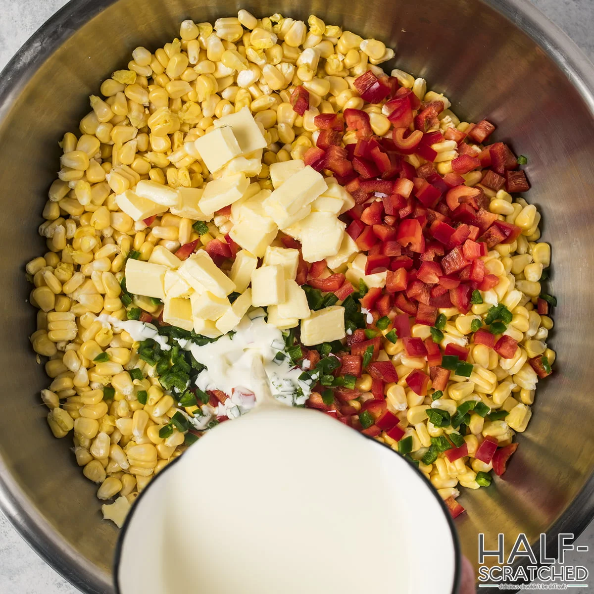 Corn kernels removed from the cob in a large bowl