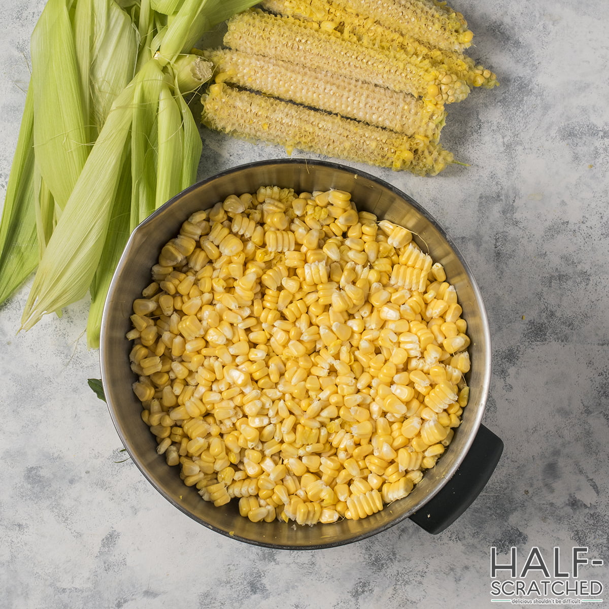 Corn kernels removed from the cob in a large bowl