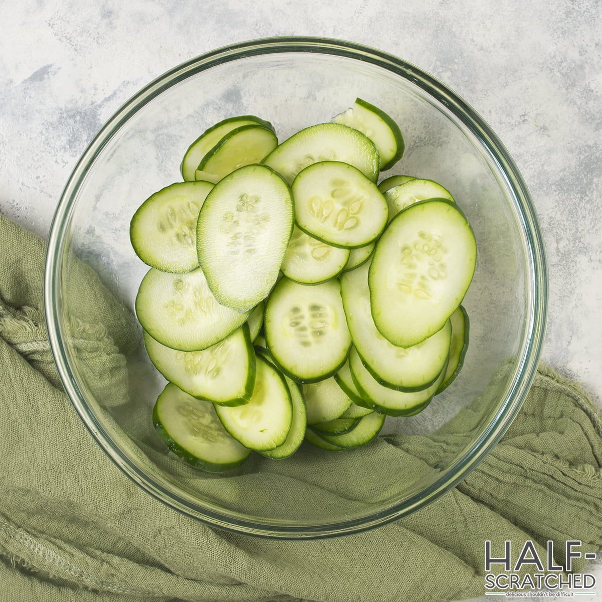 Bowl of sliced cucumbers