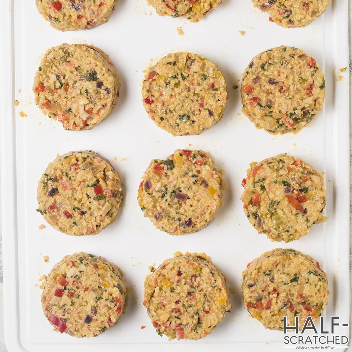 Prepared crab cakes ready for frying