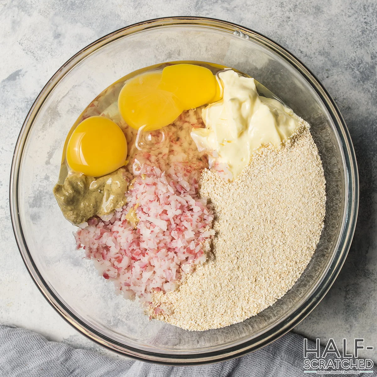 Ingredients for crab cakes in a bowl