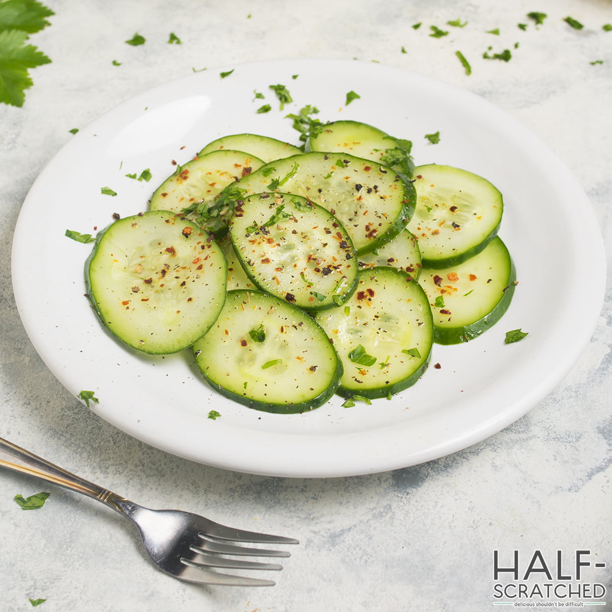 Cucumber slices seasoned on a plate