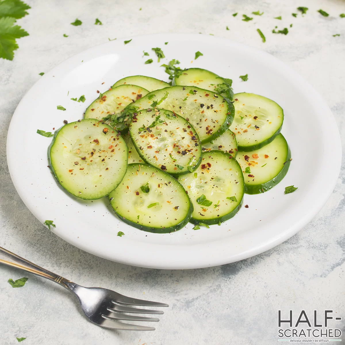 Cucumber slices seasoned on a plate