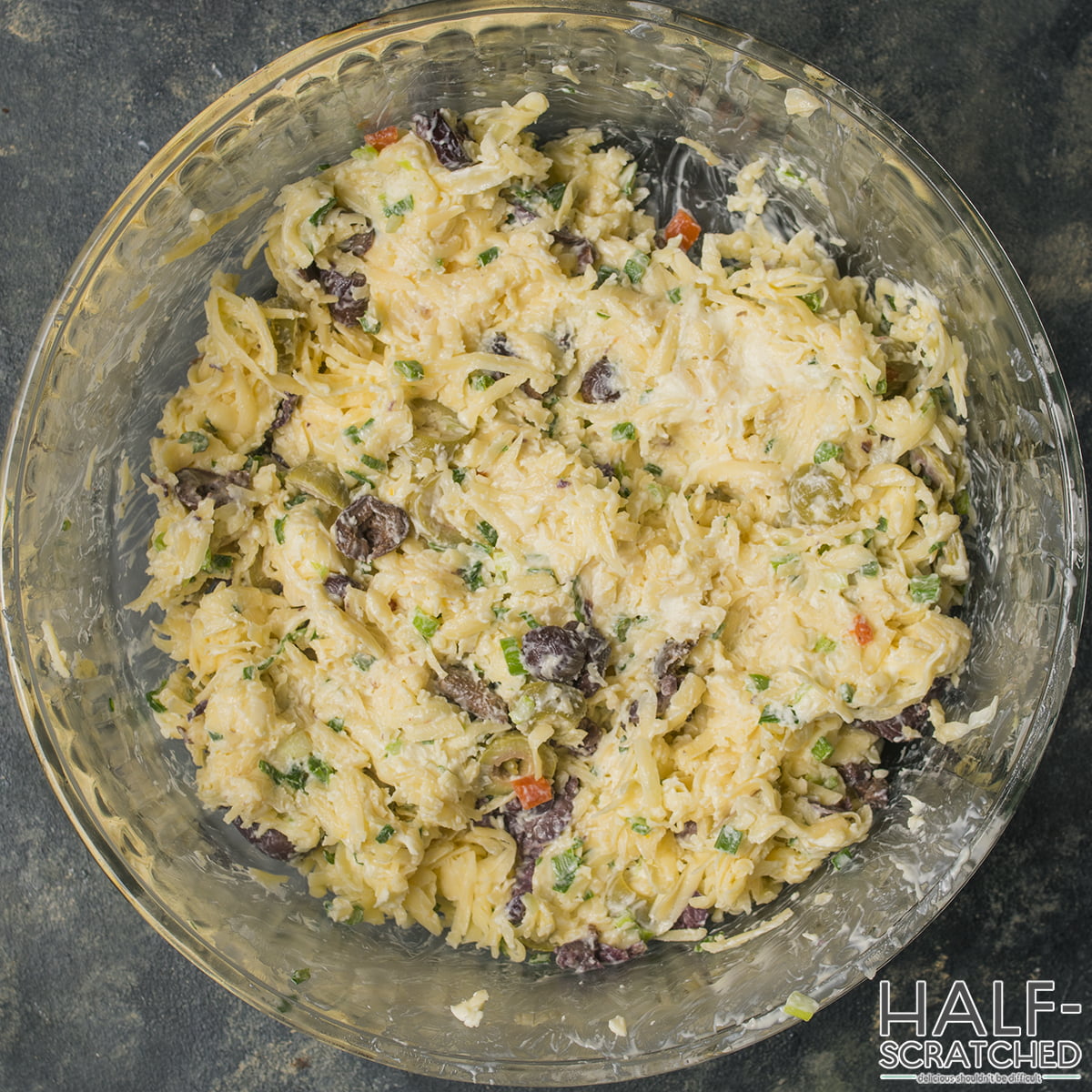 Olive and cheese mixture in a bowl for olive bread