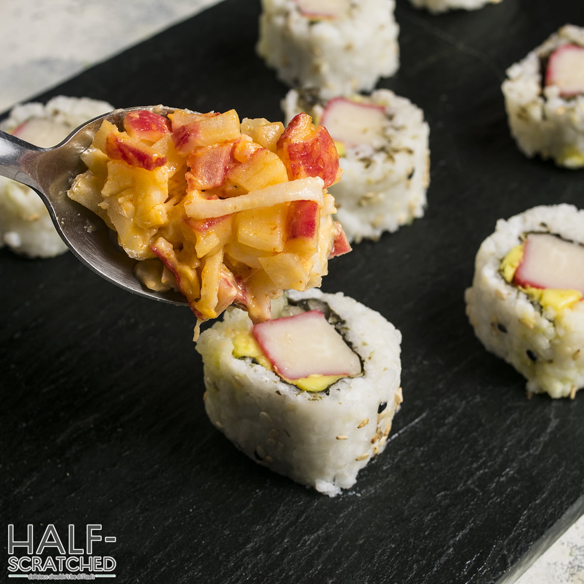 Spoon with Volcano Roll Sushi Topping